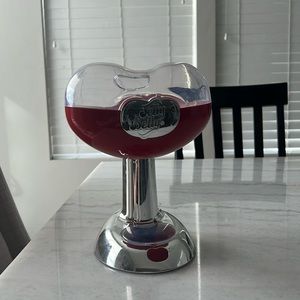 Cute, automatic jelly bean dispenser